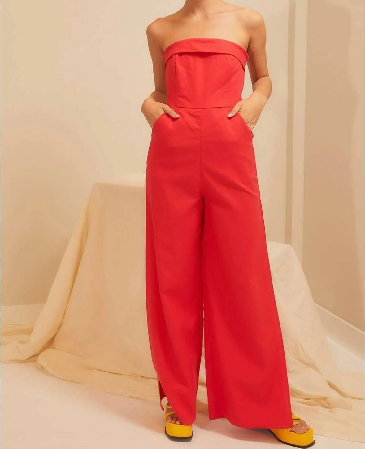 The Rylie Jumpsuit: Side Slit Strapless Red Jumpsuit