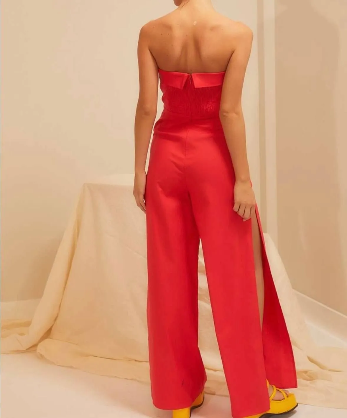 The Rylie Jumpsuit: Side Slit Strapless Red Jumpsuit